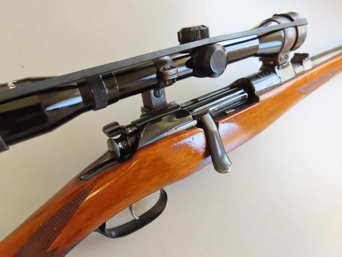 A classic bolt-action rifle with a mounted scope, ideal for hunters and shooting enthusiasts seeking high performance and reliable ammunition from Colonial Ammunition Company.