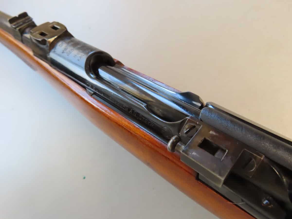 Vintage firearm with bolt-action mechanism, part of Colonial Ammunition Company collection.