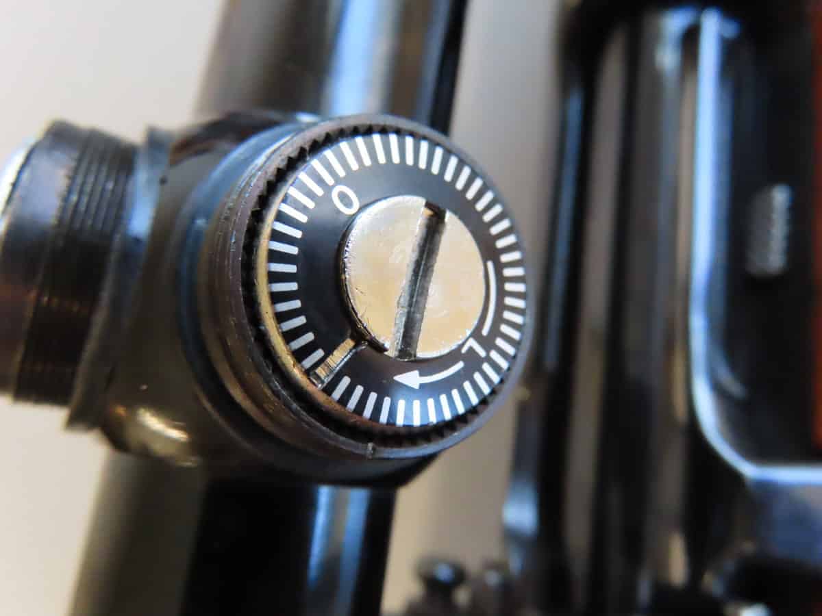 Close-up of a black safe dial lock, used for securing valuable items and firearms.