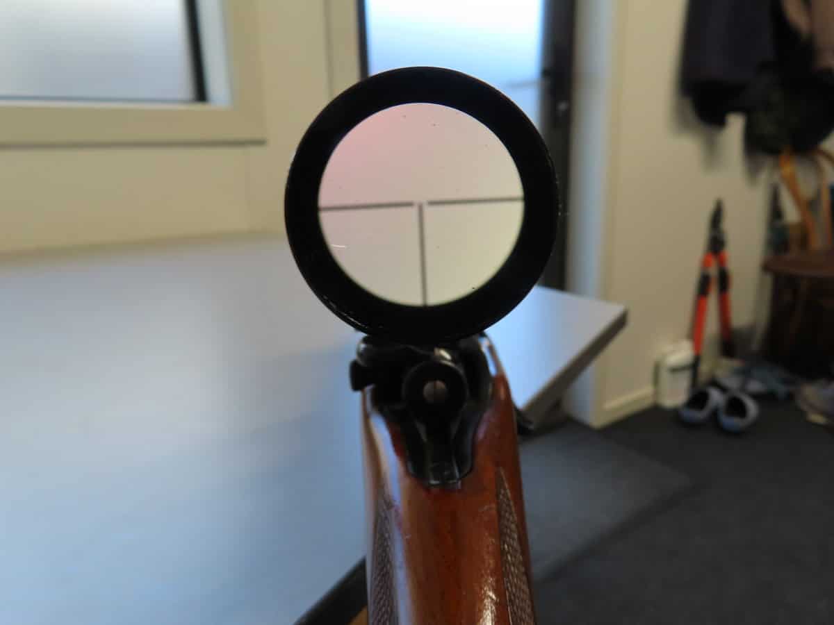 High-resolution image of rifle scope aiming reticle, showcasing precision shooting equipment from Colonial Ammunition Company NZ.