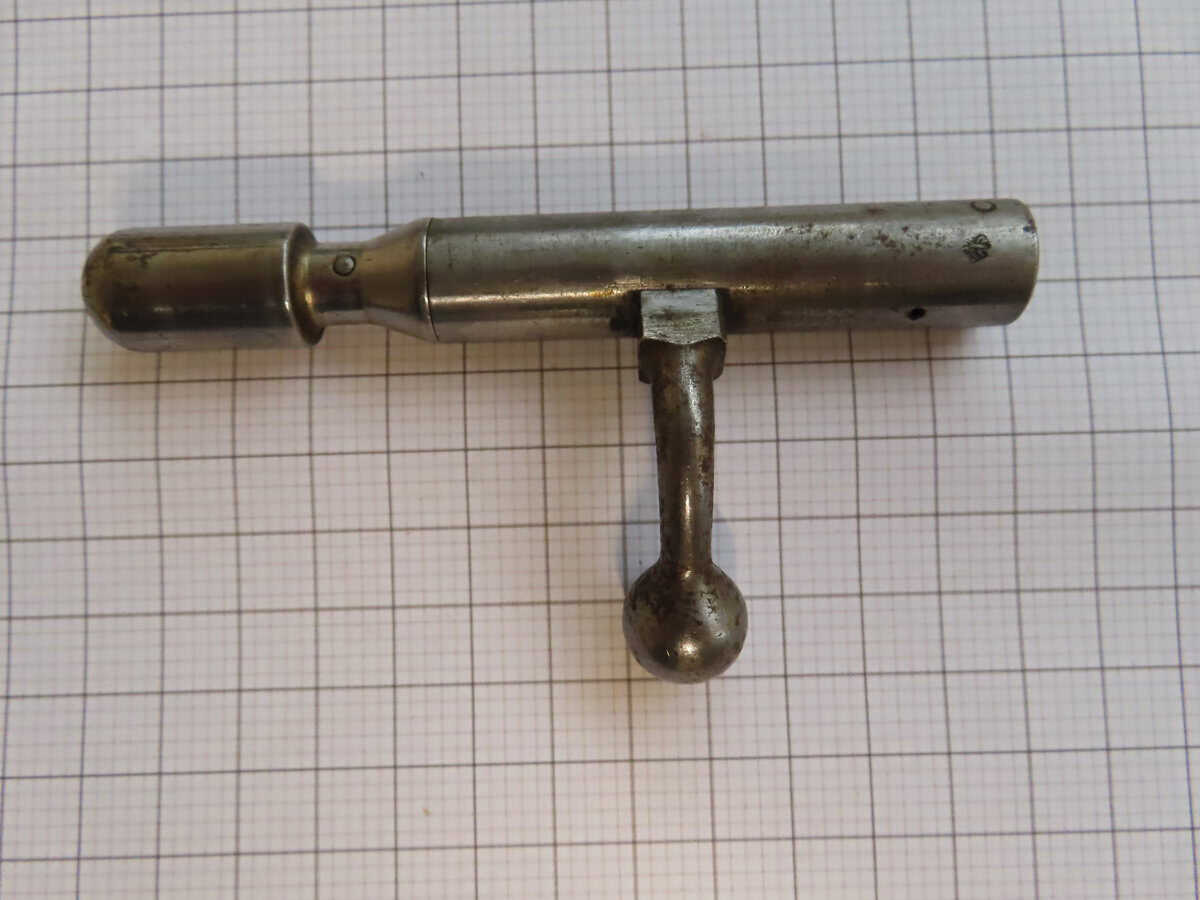 Historical firearm accessory for ammunition reloading and maintenance.