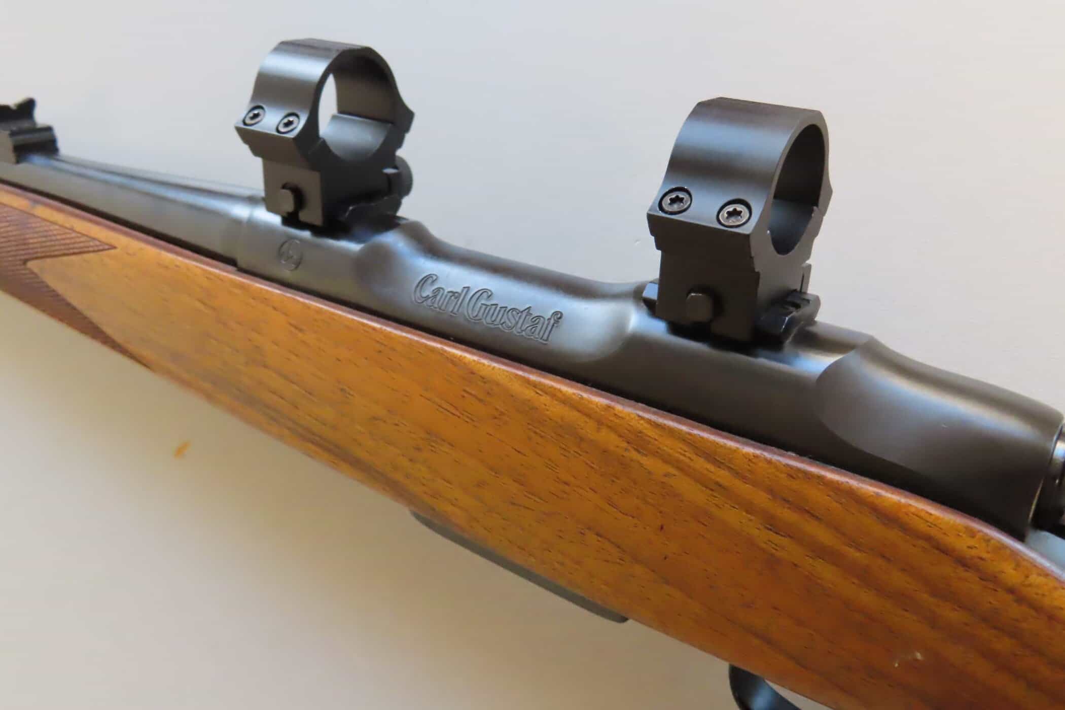 Reliable and precise rifle scope mounts on classic firearm for hunting and shooting sports, showcasing quality craftsmanship.