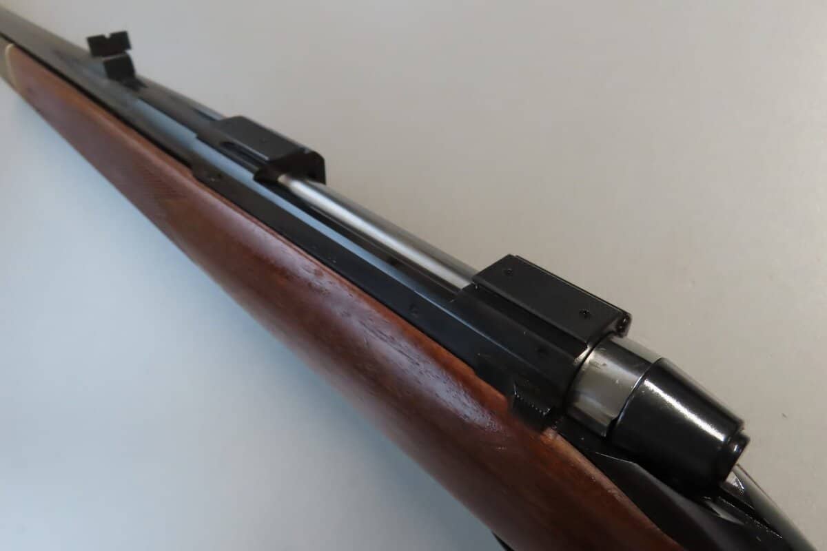 High-quality vintage firearm rifle with wooden stock, suitable for collectors and shooting sports.