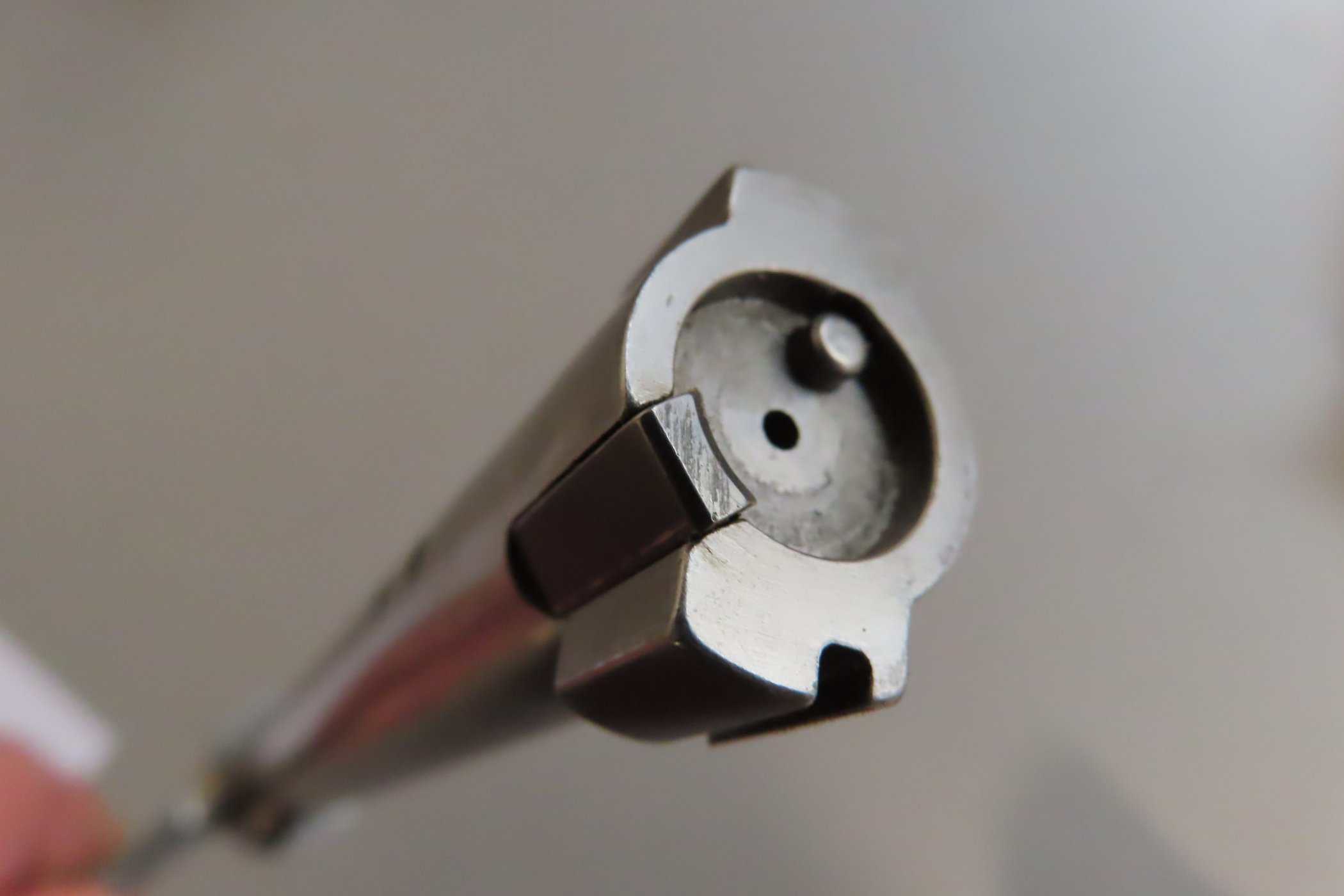 Antique firearm barrel with detailed metalwork, highlighting historical gun manufacturing.