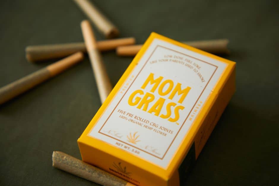 Yellow mom grass box with pre-rolled joints