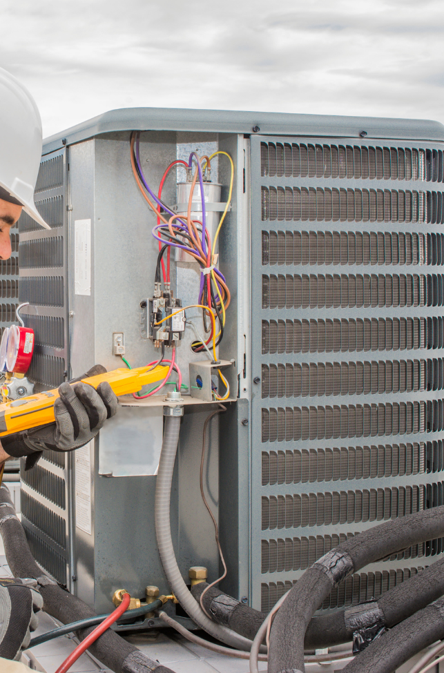 HVAC-Technician-Diagnosing-Air-Conditioner-Condenser-Electrical-Components