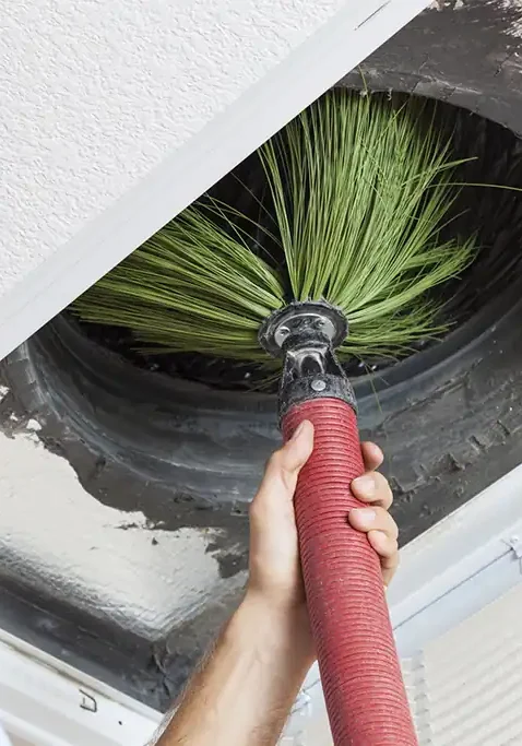 Air-Duct-Cleaning-Brush-Inside-Ceiling-Vent