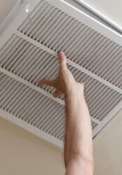 Checking-Ceiling-Air-Vent-For-Indoor-Air-Quality
