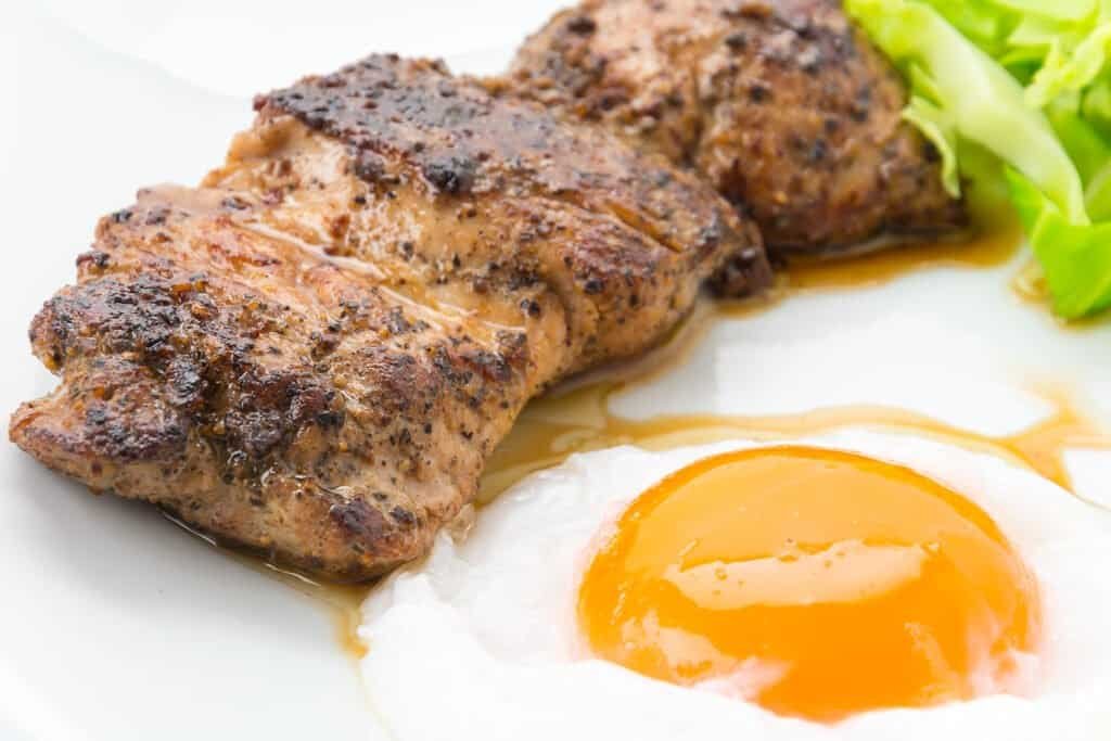 pork steak on white plate