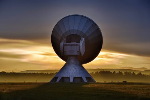 Image of a satellite station at dawn