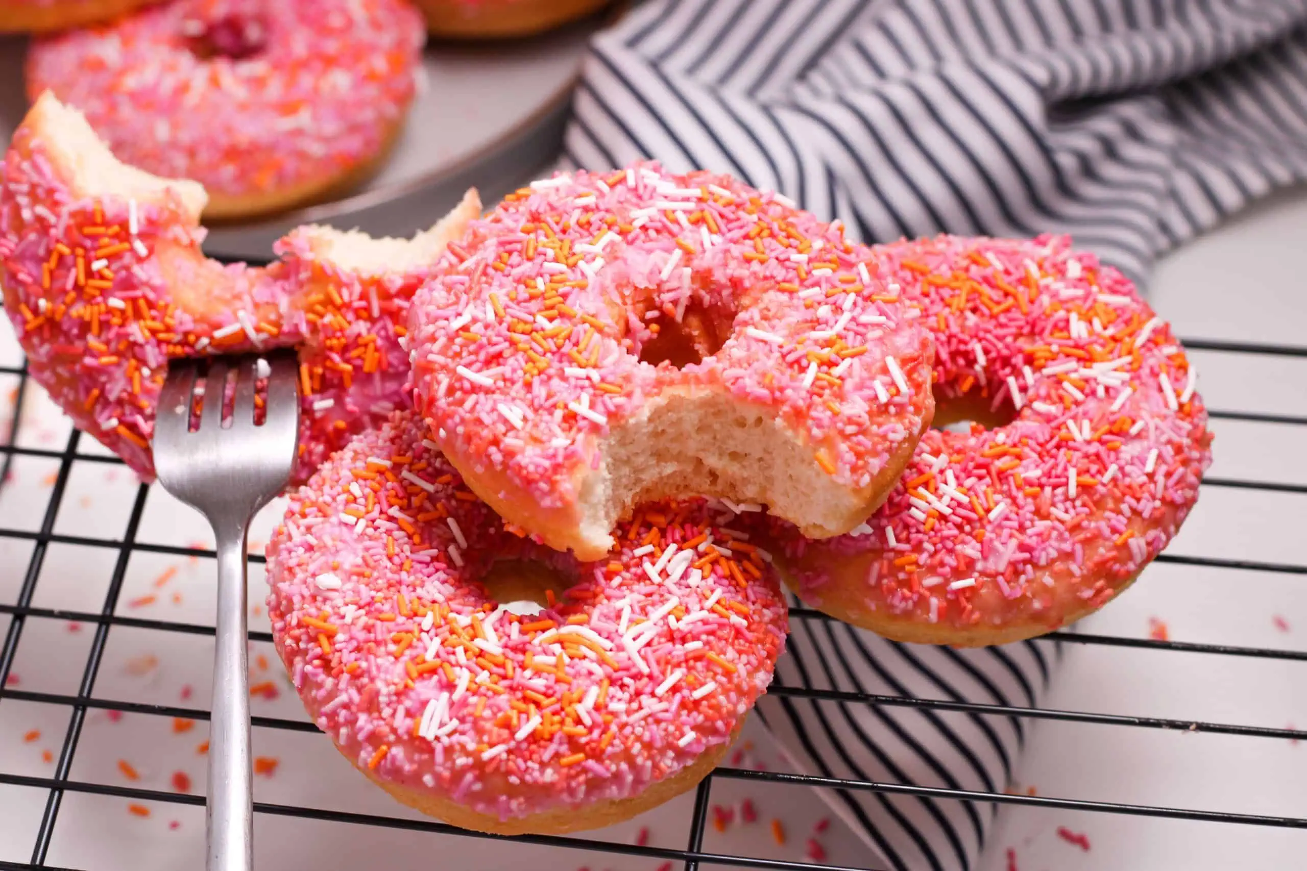 Homemade pink and orange donuts