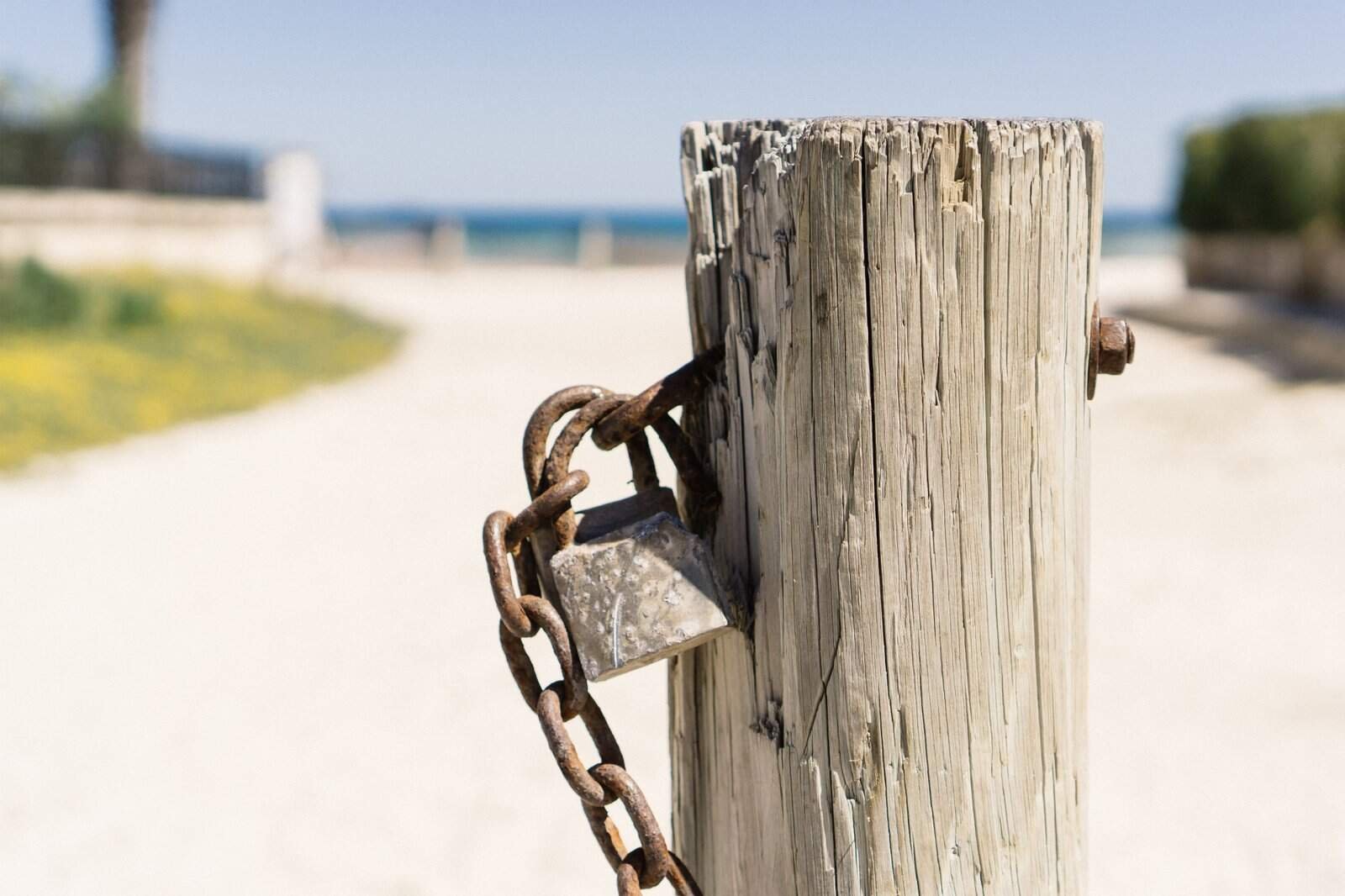 Post with chain and lock