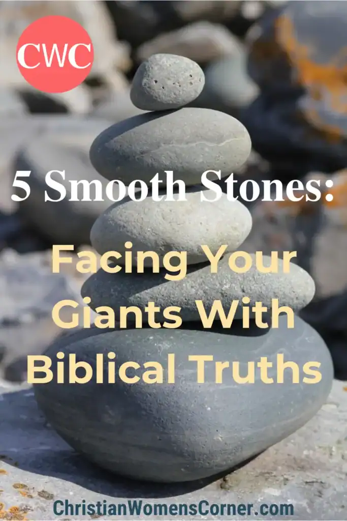 Five smooth stones in a rock pile symbolizing facing your giants Five smooth stones in a rock pile symbolizing facing your giants