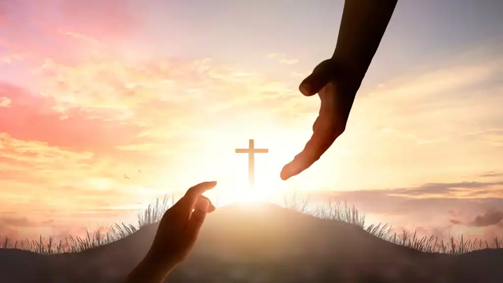 God holding his hand out to a woman with a cross in the background symbolizing "You are chosen" God holding his hand out to a woman with a cross in the background symbolizing "You are chosen"
