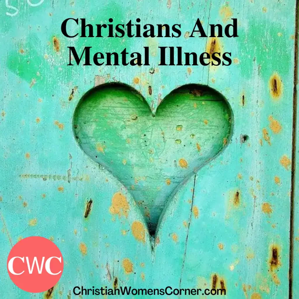 A heart cared out of a green wooden fence