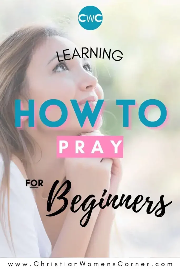 A young Christian woman with her hands clasped in daily prayer looking up