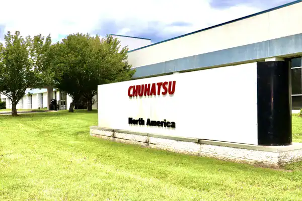 Chuhatsu North America, Inc. corporate office sign showcasing company branding and location in North America, highlighting industrial manufacturing and business operations.