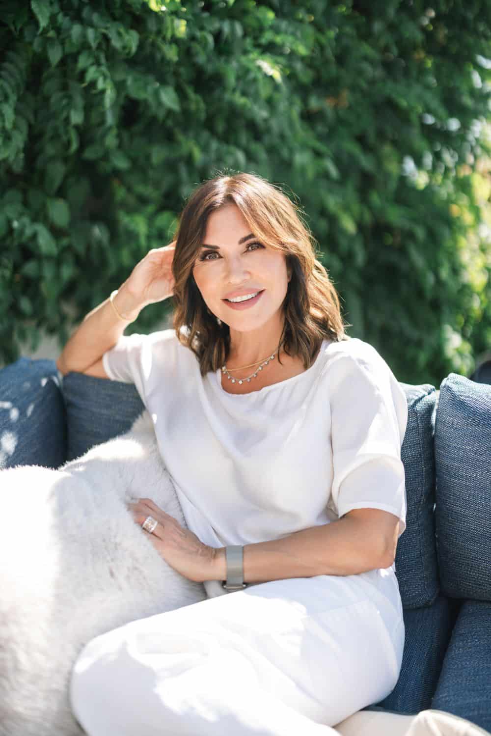 Photo of Cindy sitting outside