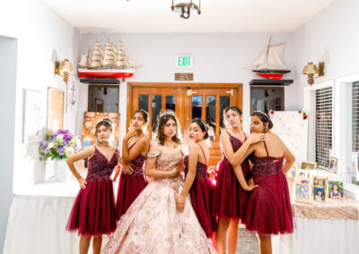 cinecrown-quinceanera-photography-with-damas-getting-ready-inside-far