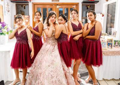 A group of bridesmaids posing for a photo.