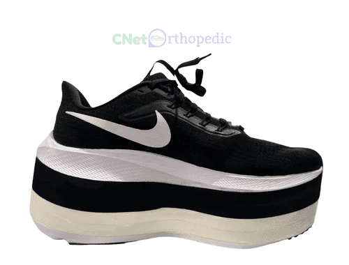 CNET Orthopedic custom shoe lift on Nike sneaker