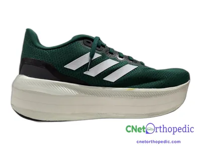Shoe lift added to a men's black Adidas sneaker