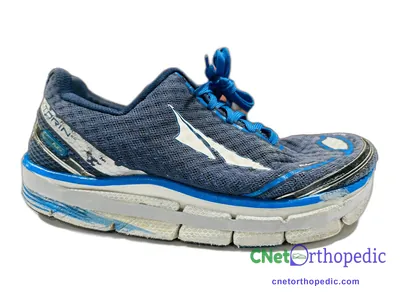 Shoe lift added to a men's blue Altra sneaker