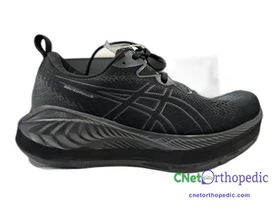 Shoe lift added to a men's black Asics sneaker