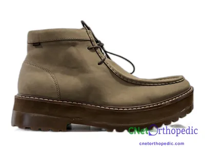 Shoe lift added to a men's grey Clarks boot