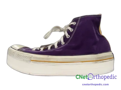 Shoe lift added to a women's black Converse Chuck Taylor sneaker