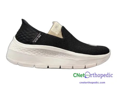 Shoe lift added to a women's black Skechers sneaker