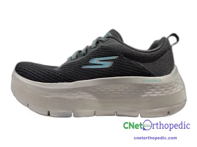 Shoe lift added to a women's black Skechers sneaker