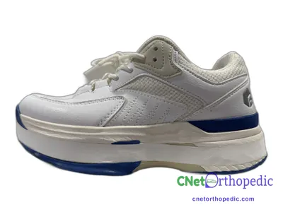 Shoe lift added to a grey sneaker