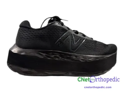 Shoe lift added to a men's black New Balance sneaker