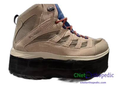Shoe lift added to a men's brown boot