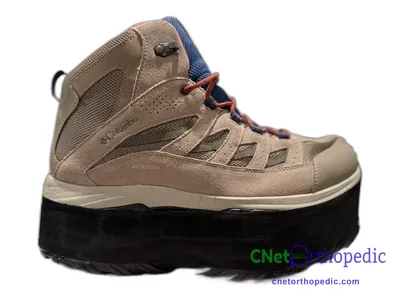 Shoe lift added to a men's brown boot