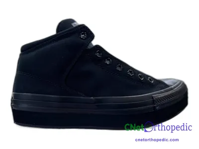 Shoe lift added to a women's black boot