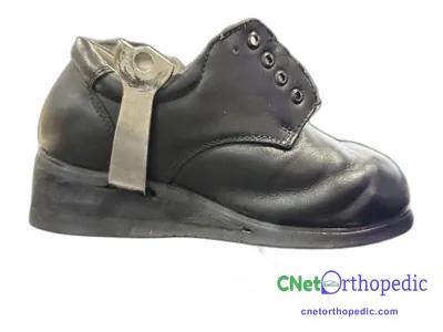 Shoe lift added to a men's grey boot