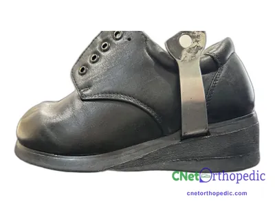 Shoe lift added to a men's grey boot