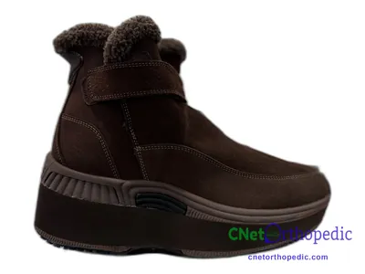 Shoe lift added to a women's black boot