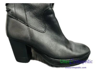 Shoe lift added to a women's grey boot