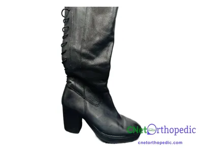 Shoe lift added to a women's grey boot