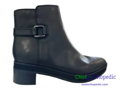 Shoe lift added to a women's black boot
