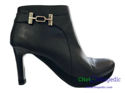 Shoe lift added to a women's black boot