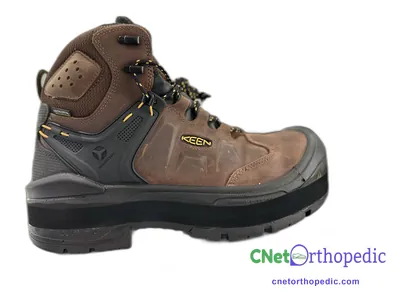 Shoe lift added to a men's Keen boot