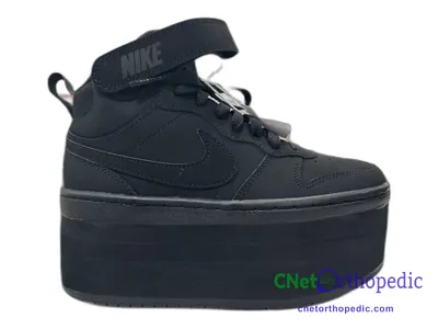 Shoe lift added to a men's black Nike sneaker