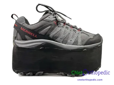 Shoe lift added to a men's grey Merrell sneaker