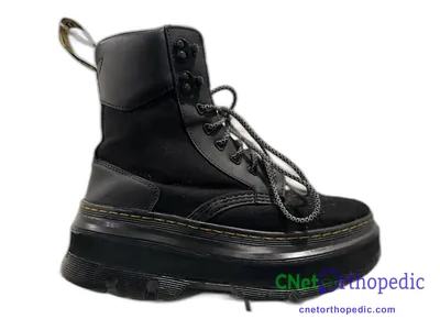 Shoe lift added to a men's black Dr. Martens boot