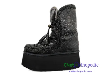 Shoe lift added to a women's Mou boot