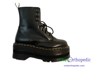 Shoe lift added to a women's black Dr. Martens boot
